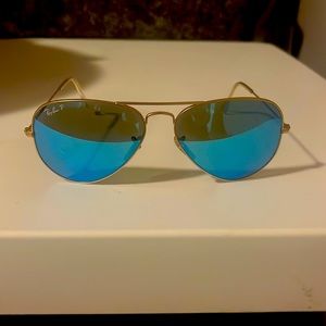 Ray Ban Blue Aviator Sunglasses with Gold frame.